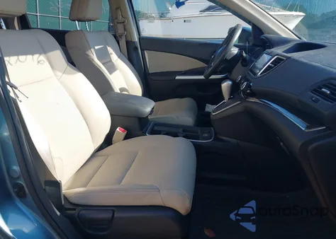 2015 Honda Cr-V Touring z USA, uszkodzony, nr VIN 5J6RM4H95FL008957